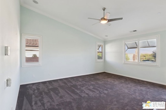 carpeted spare room featuring lofted ceiling, crown molding, and ceiling fan