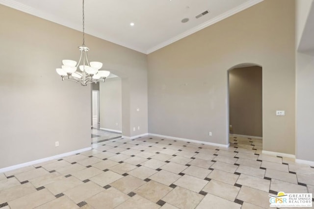 unfurnished room with an inviting chandelier and ornamental molding