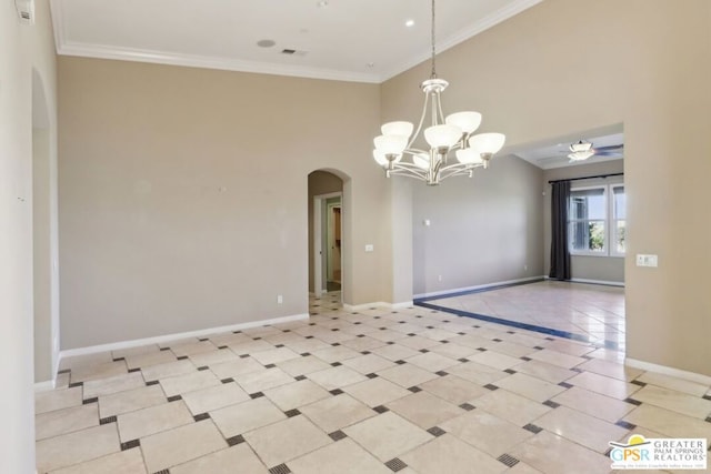 tiled empty room with ceiling fan with notable chandelier, ornamental molding, and a towering ceiling