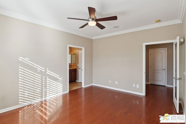 empty room featuring dark wood-type flooring, ornamental molding, and ceiling fan