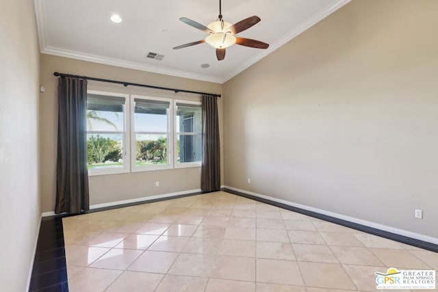 spare room featuring ceiling fan, ornamental molding, and light tile patterned floors