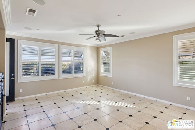 empty room with ceiling fan and ornamental molding