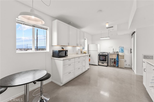 kitchen featuring white cabinetry, sink, white fridge, decorative light fixtures, and stainless steel electric stove