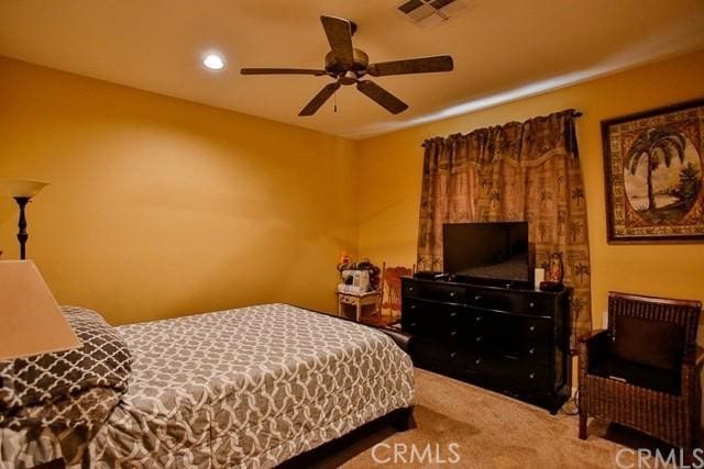 bedroom featuring carpet and ceiling fan