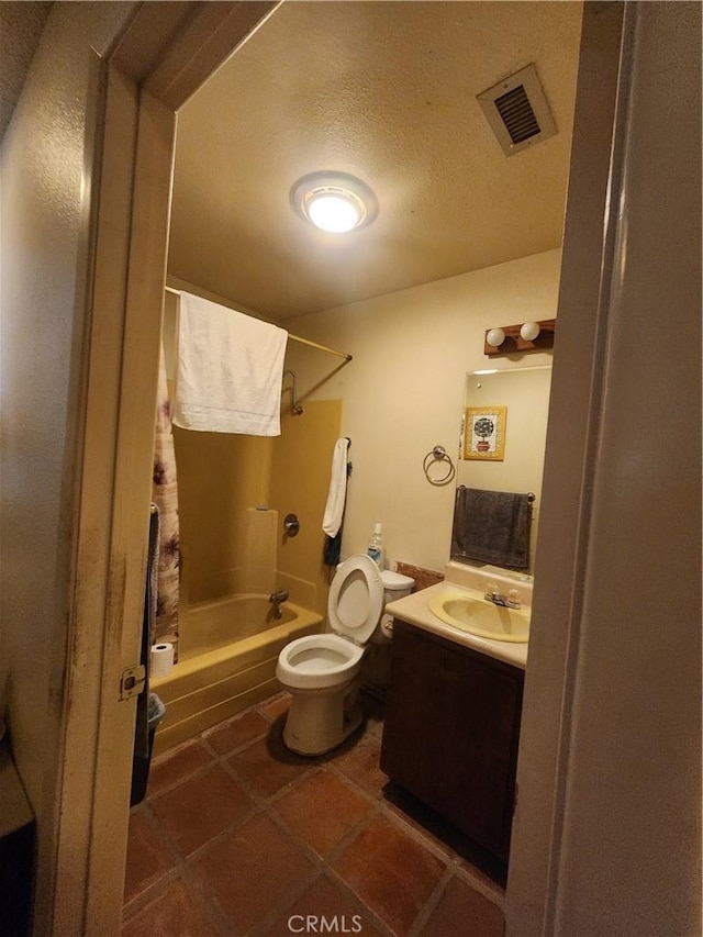 2763 US Highway 111, Imperial, CA 92251 - full bathroom with shower / bathing tub combination, tile patterned flooring, vanity, toilet, and a textured ceiling