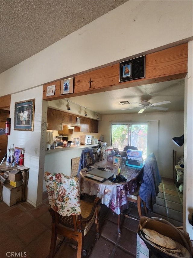2763 US Highway 111, Imperial, CA 92251 - dining space featuring ceiling fan and a textured ceiling