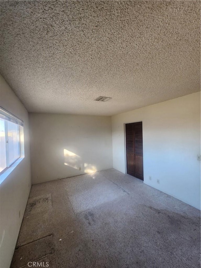 2763 US Highway 111, Imperial, CA 92251 - spare room featuring a textured ceiling