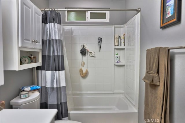 full bath featuring toilet and shower / bath combination with curtain