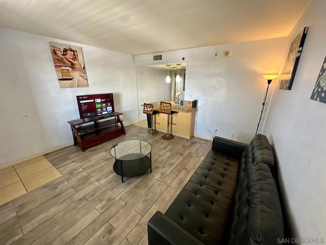 living room featuring light hardwood / wood-style flooring