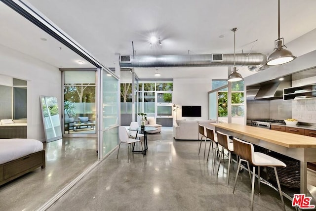 interior space featuring floor to ceiling windows