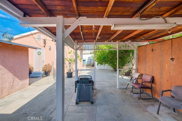 view of patio with a grill