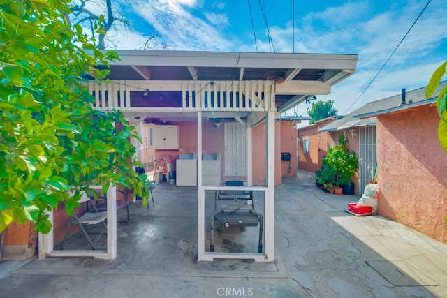 view of patio featuring washer / clothes dryer