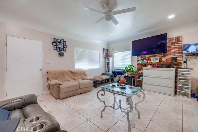 tiled living room with ceiling fan