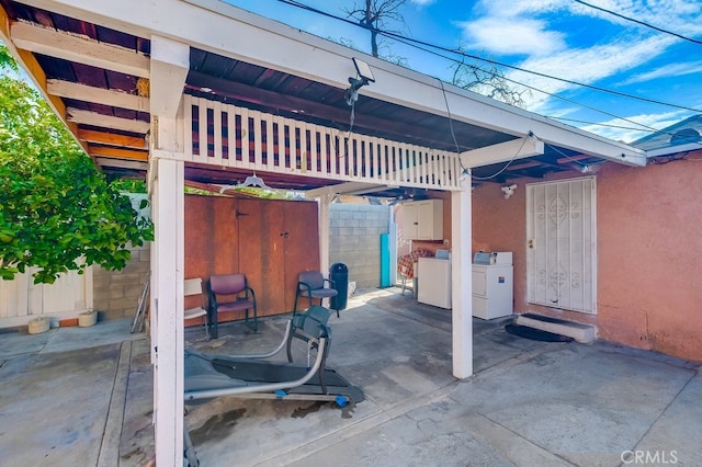 view of patio / terrace with washer and clothes dryer