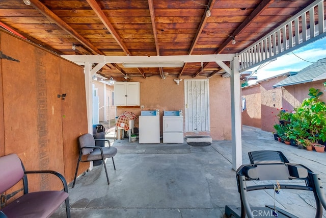 view of patio / terrace with separate washer and dryer