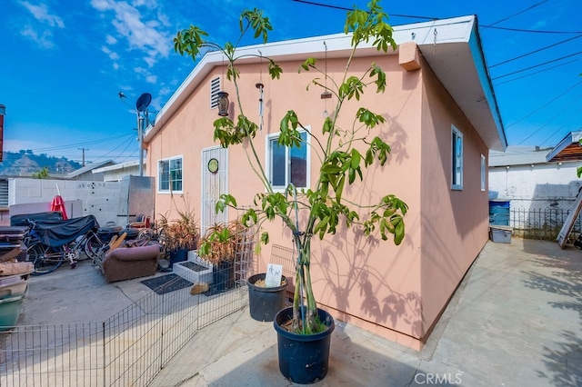 rear view of property with a patio area