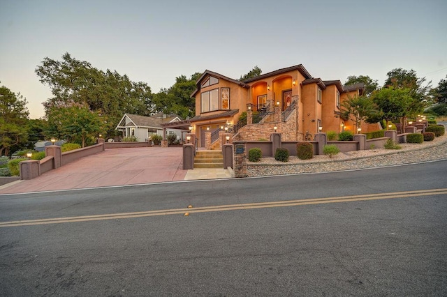 view of front of property with a garage