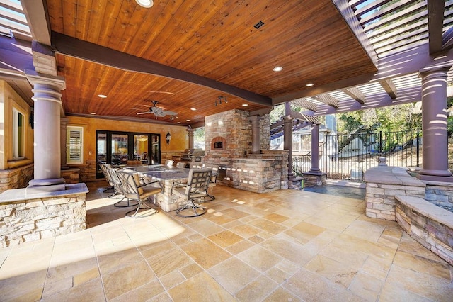 view of patio / terrace with ceiling fan and a pergola