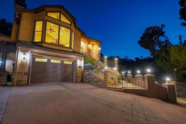 view of front of property with a garage