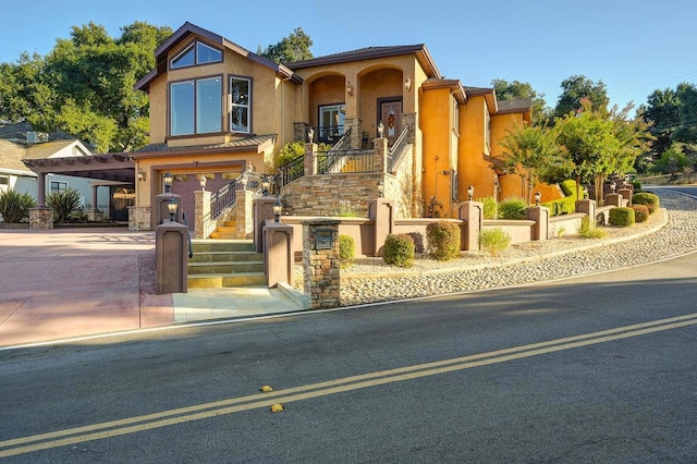 view of front of property with a garage