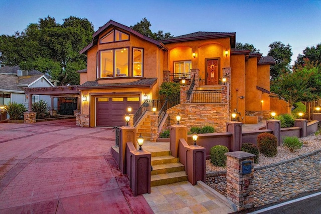 view of front of property with a garage