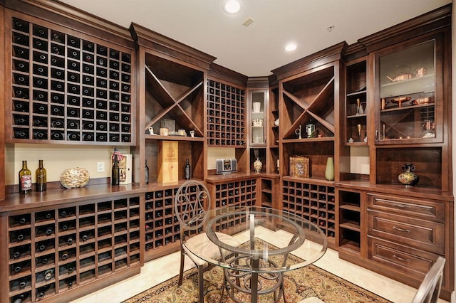 wine cellar featuring light tile patterned flooring