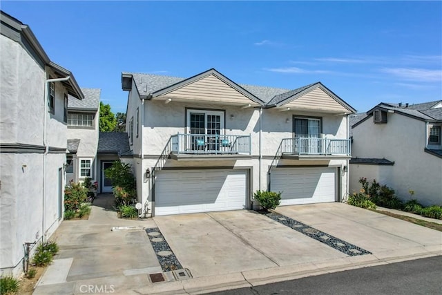 townhome / multi-family property featuring a balcony