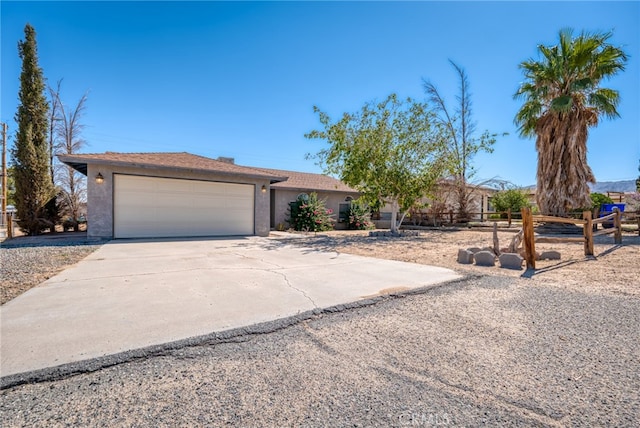 single story home with a garage