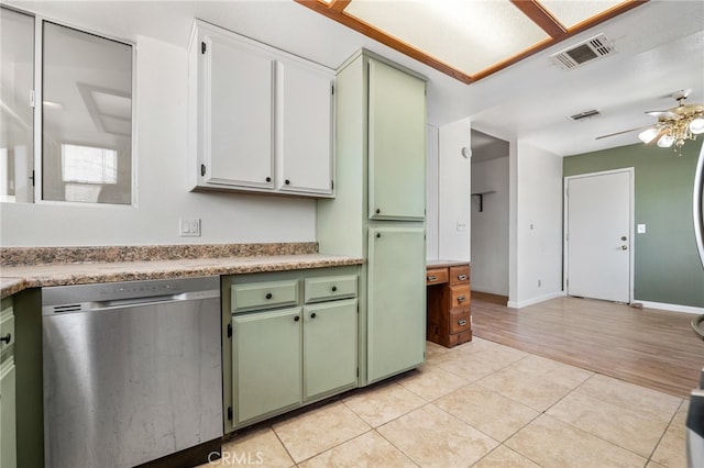 kitchen featuring ceiling fan, dishwasher, green cabinetry, and light hardwood / wood-style floors