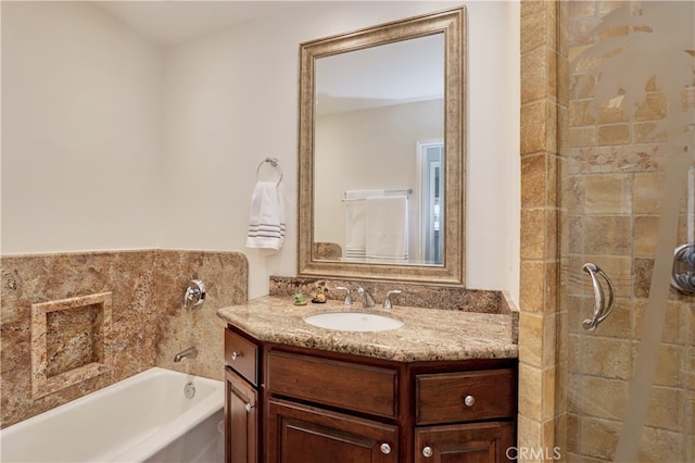 bathroom featuring shower with separate bathtub and vanity