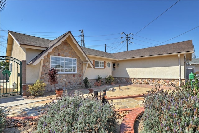 ranch-style house with a patio area