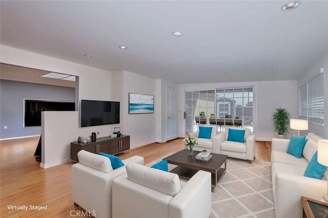 living room featuring light wood-type flooring