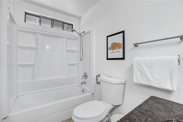 bathroom featuring toilet and shower / bath combination