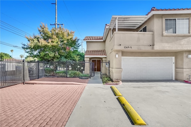 view of front of property featuring a garage