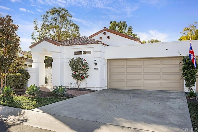 view of front of home with a garage