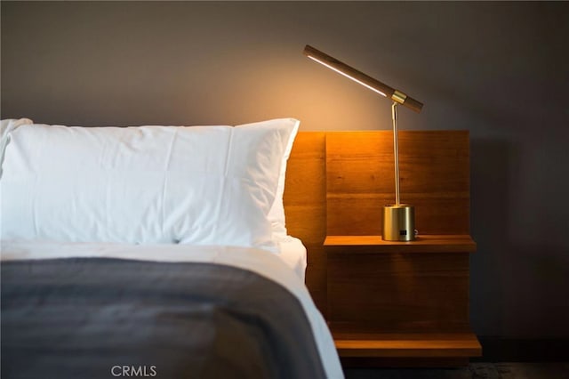 bedroom featuring hardwood / wood-style flooring