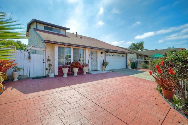 single story home with a garage