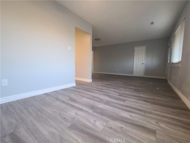 38633 Glenbush Ave, Palmdale, CA 93550 - empty room featuring wood finished floors and baseboards