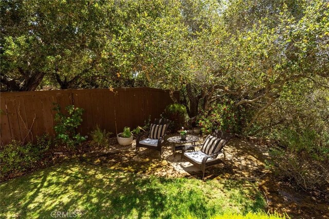 1385 Corberosa Dr, Arroyo Grande, CA 93420 - view of yard featuring a patio and fence