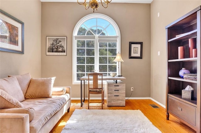 1385 Corberosa Dr, Arroyo Grande, CA 93420 - sitting room with visible vents, baseboards, a notable chandelier, and wood finished floors