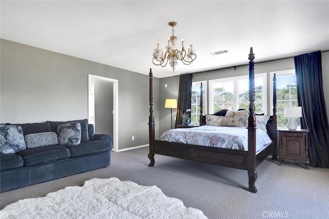 carpeted bedroom with a chandelier