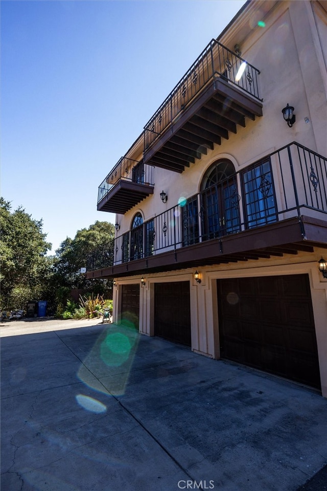 view of building exterior featuring a garage