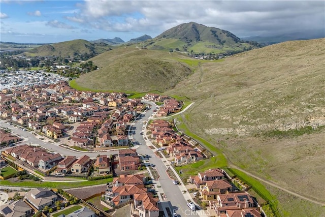 drone / aerial view featuring a mountain view