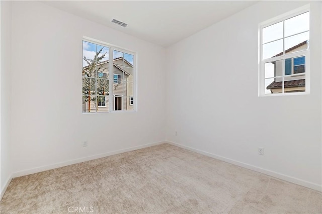 view of carpeted spare room