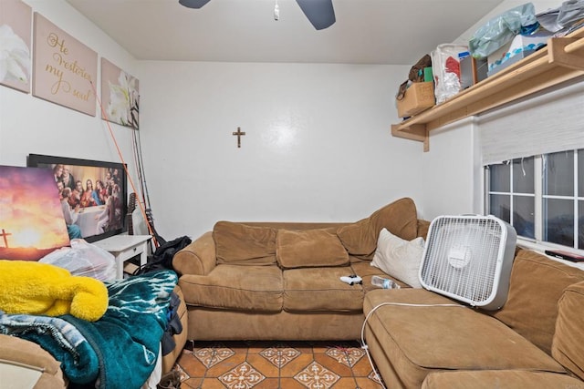 living room featuring light tile patterned floors and ceiling fan