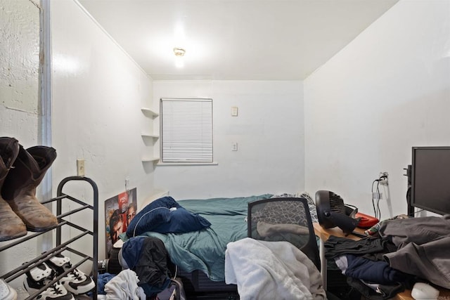 bedroom featuring ornamental molding