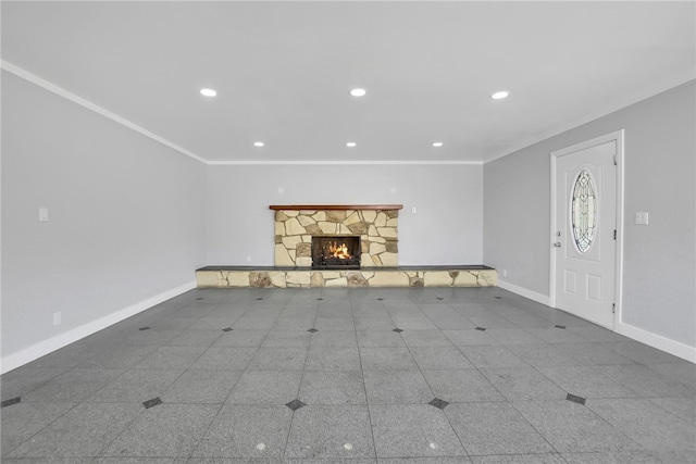 unfurnished living room with a fireplace and crown molding