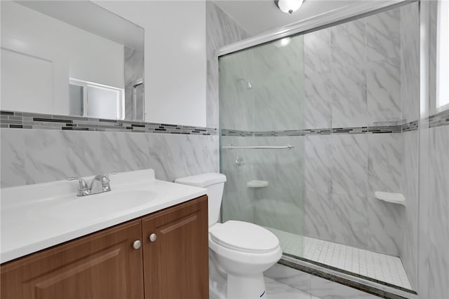 bathroom with toilet, a shower with door, tile walls, and vanity