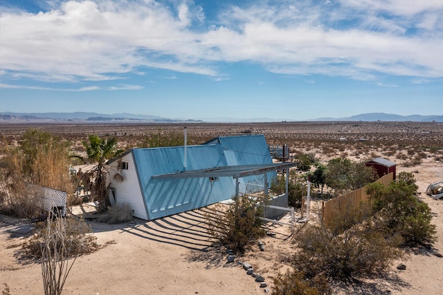 exterior space featuring a mountain view