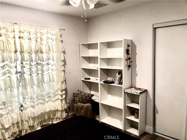 unfurnished bedroom with wood-type flooring